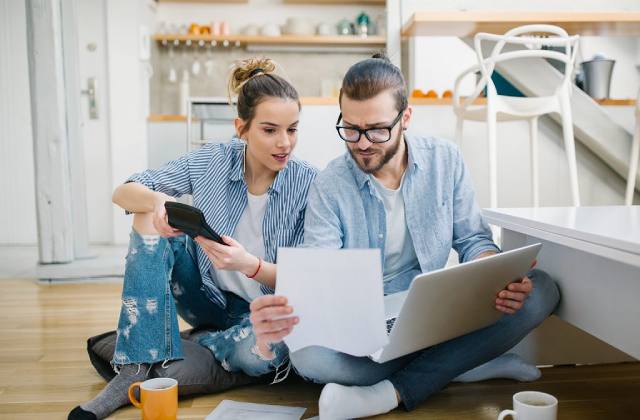 Stock image of a couple going through their financials