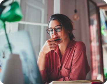 photo of woman using a computer