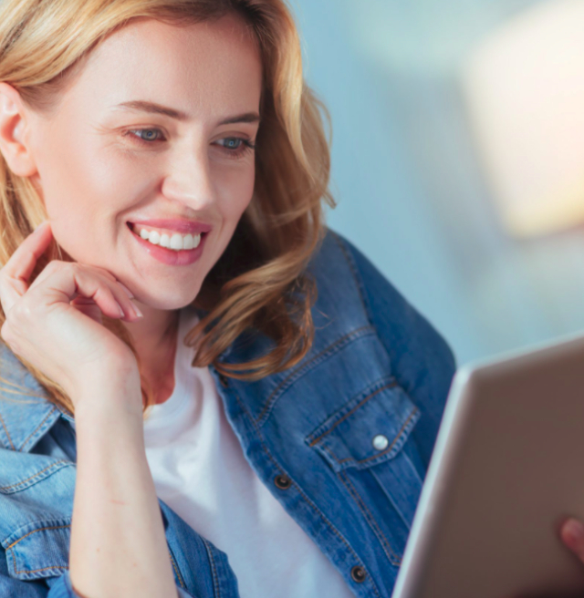 stock photo of a woman using a tablet