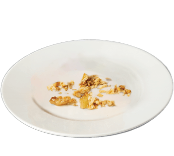 stock image of crumbs on a plate